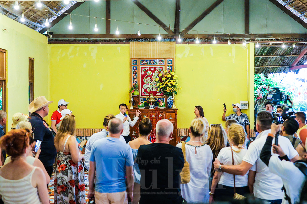 Qua cồn ăn Tết, khách Tây hào hứng trải nghiệm văn hóa miệt vườn sông nước - 5