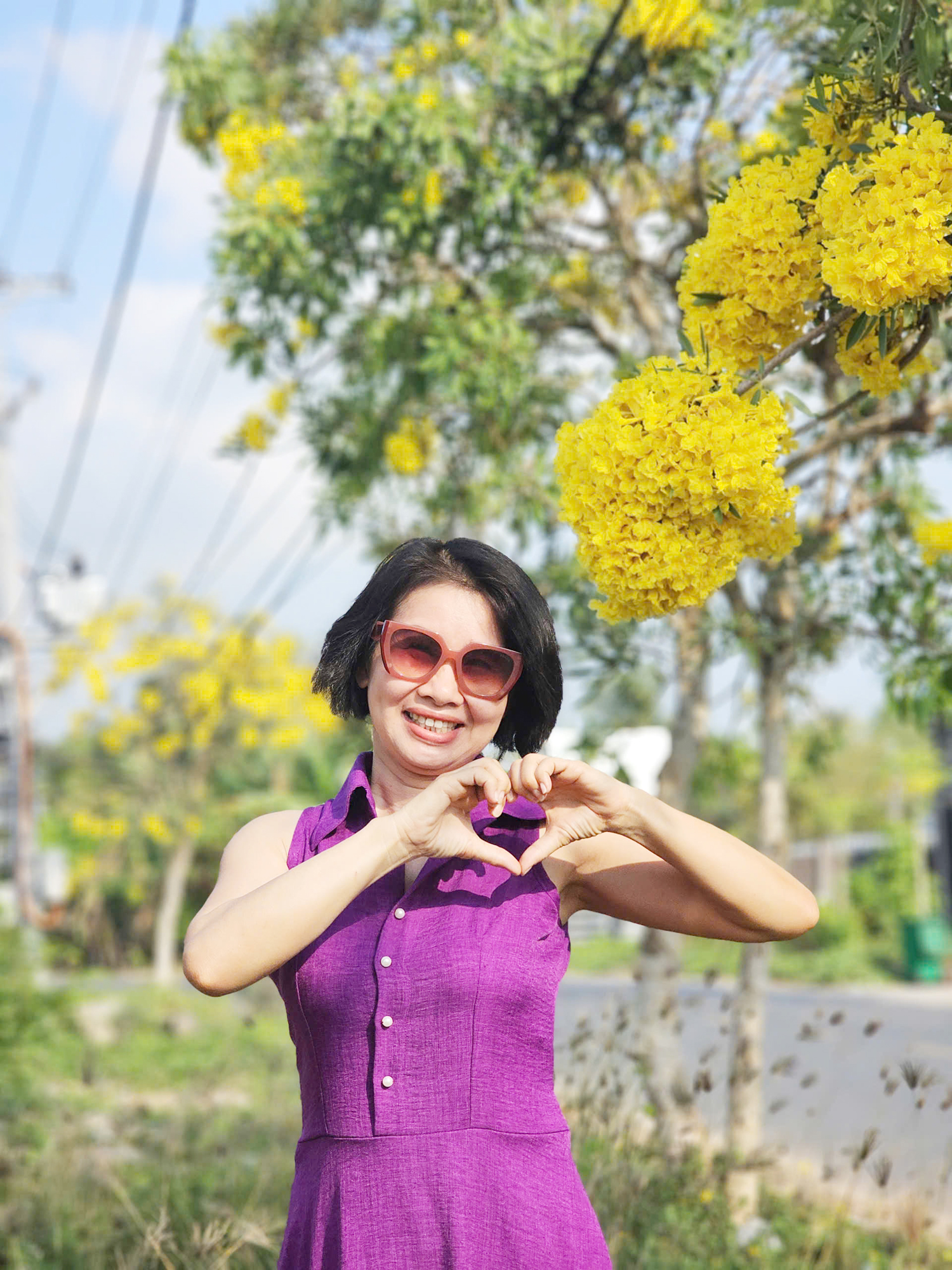 Hoa phong linh vàng rực nhiều tuyến đường ở Cần Thơ - 4