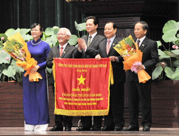 TP.Hồ Chí Minh: Lễ kỷ niệm 65 năm ngày Bác Hồ kêu gọi Thi đua Ái quốc - 1