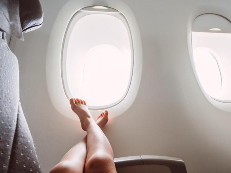 Why shouldn't you take off your shoes when flying?